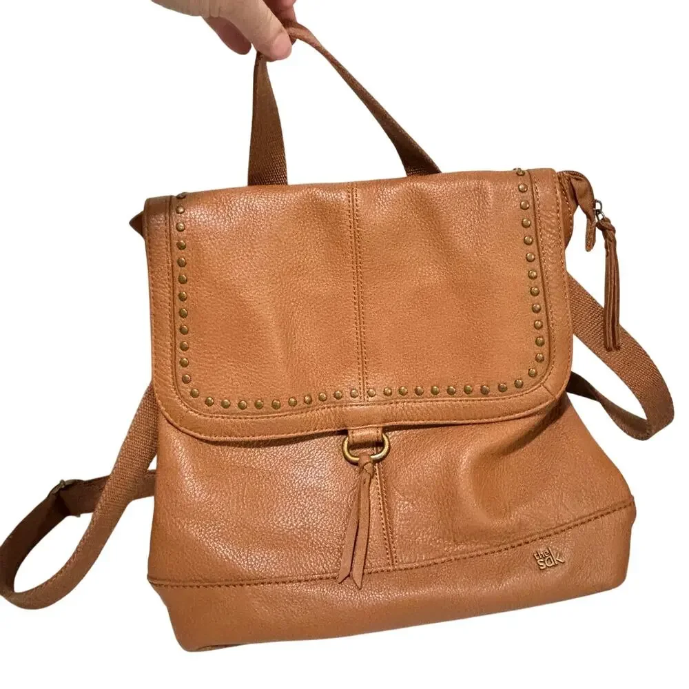 The Sak caramel brown leather messenger bag studded backpack Boho casual purse